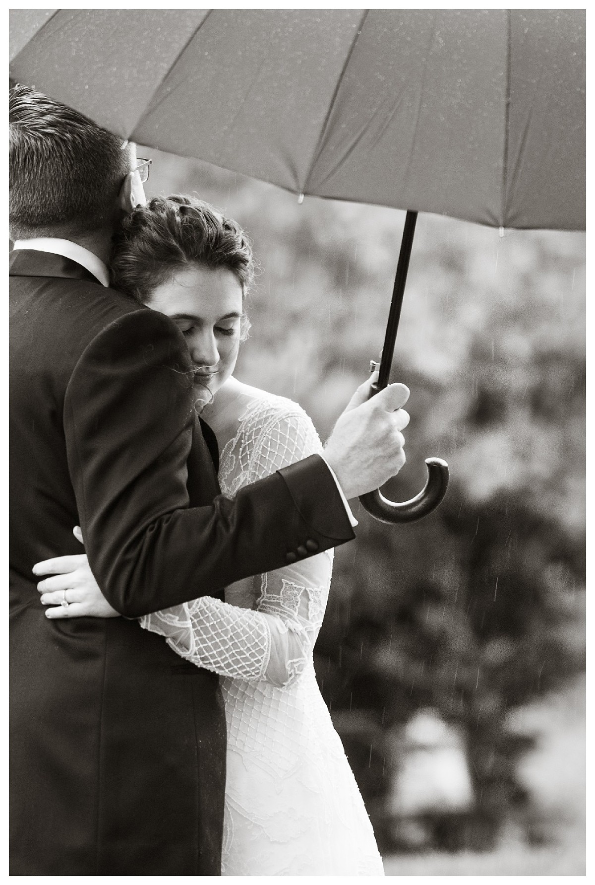 A couple embraces on their wedding day.
